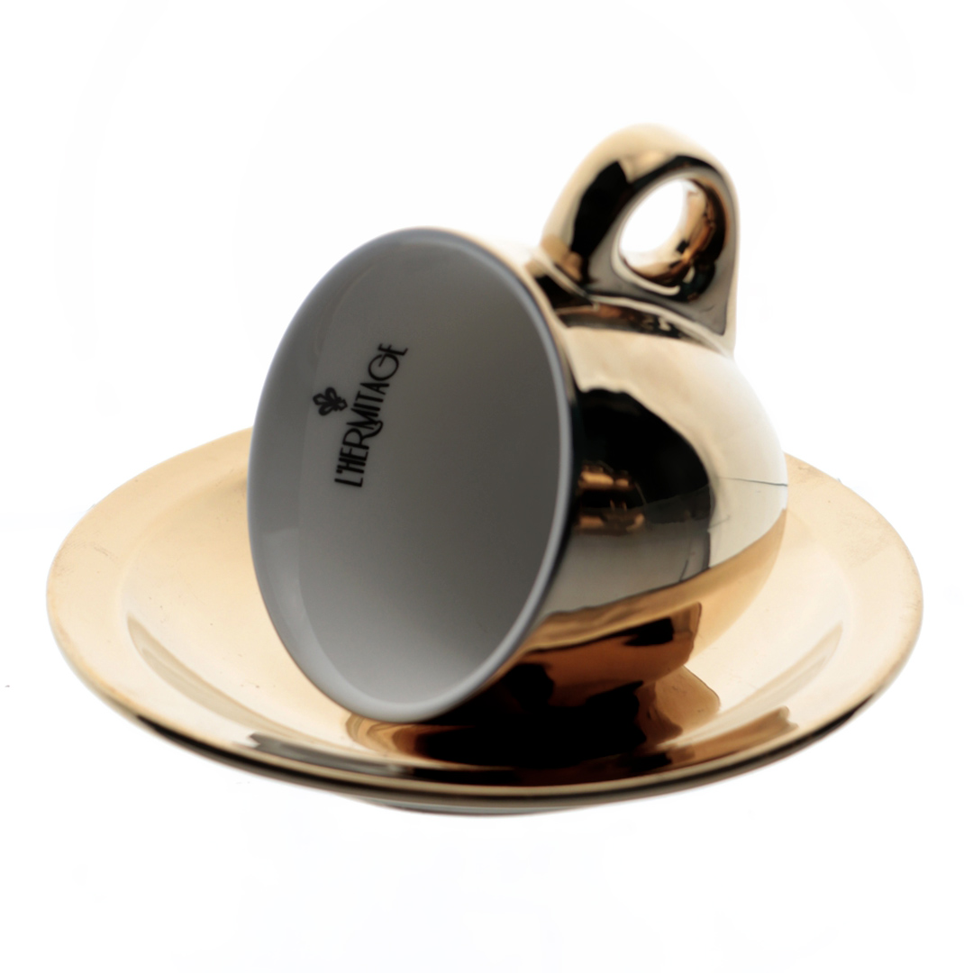 Fotografia para o produto Jogo de 12 peças para cafe em new bone china 80ml cor ouro e branca e com rack